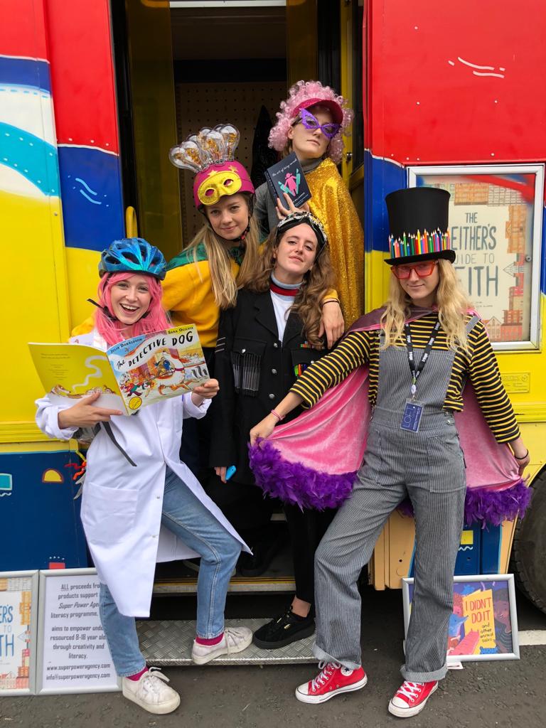 Adults and children dressing up for Super Power Agency featured in how creative space can inspire children, SBID Education Council blog post by Maxine Sloss